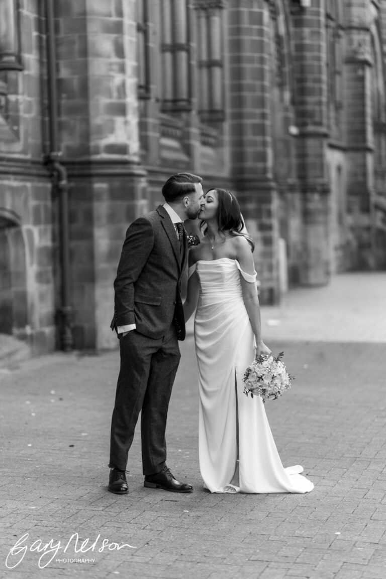 Middlesbrough registry office couple kissing in street